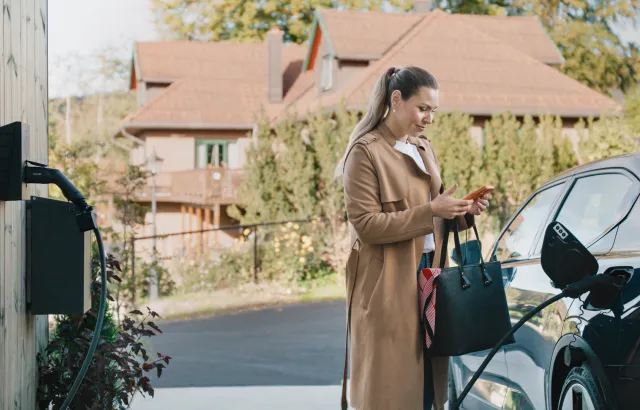 woman home charging using circle k pro app